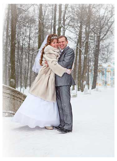 Couple enjoying their winter wedding with protection from Dreamsaver